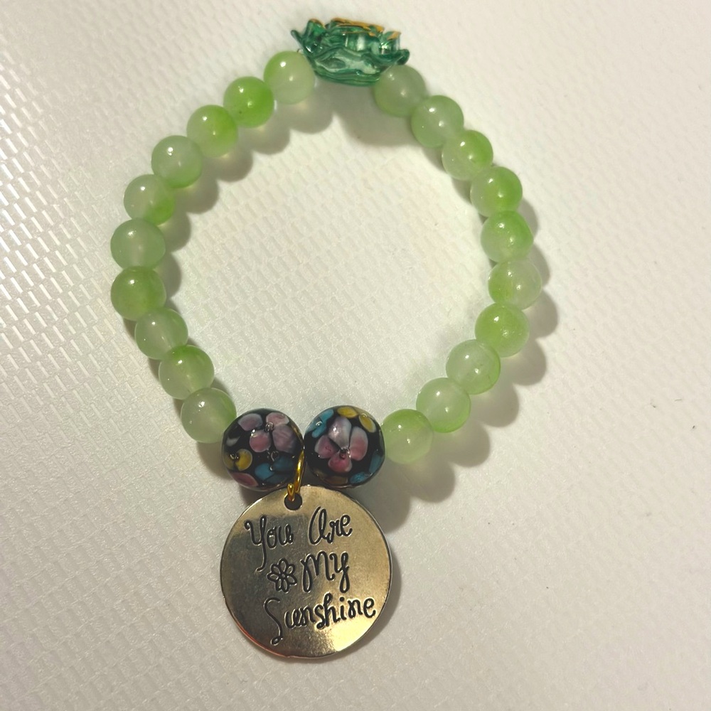 Green sunshine heart charm bracelet
